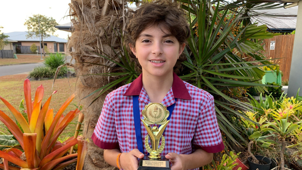 Boy Holding Award