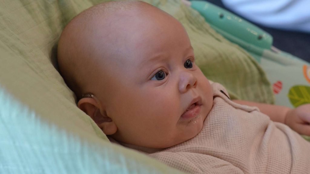 Baby with hearing aids