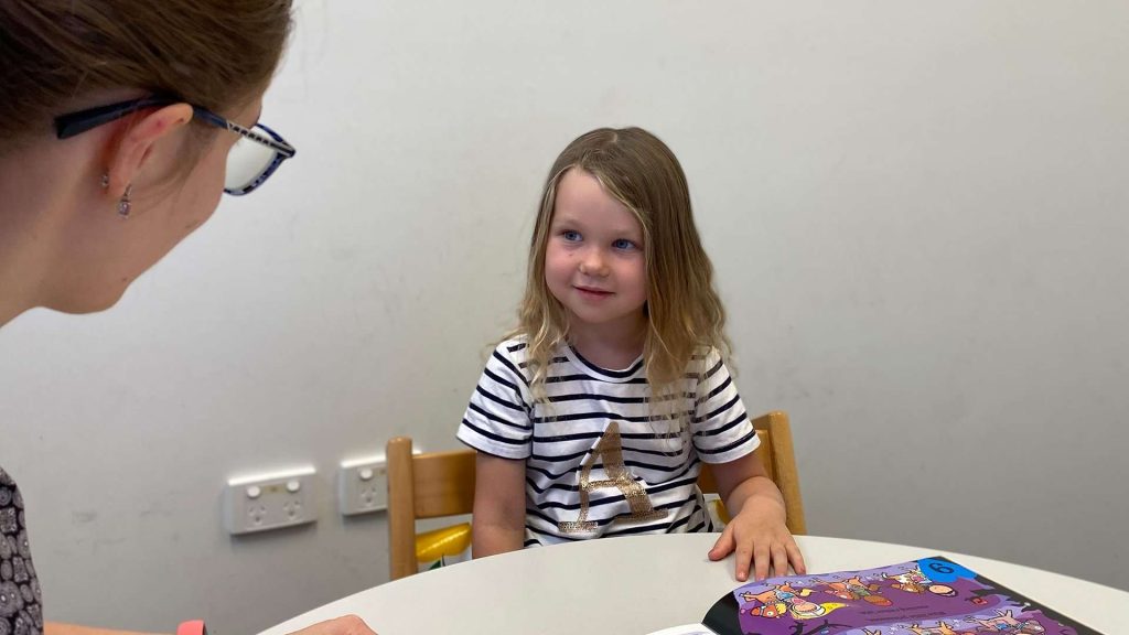 Child In Speech Therapy Lesson With Clinician