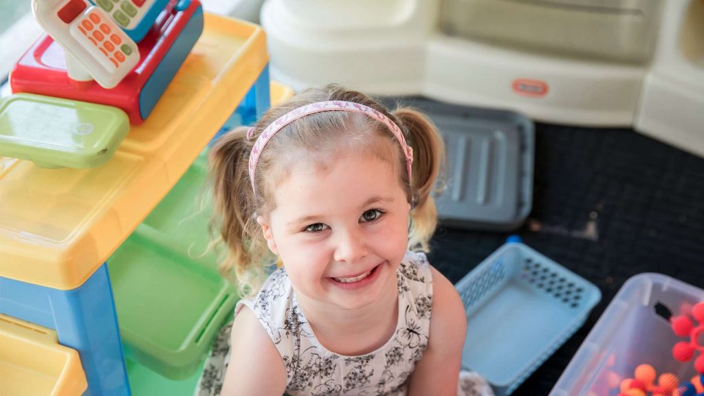 Child Smiling At Camera
