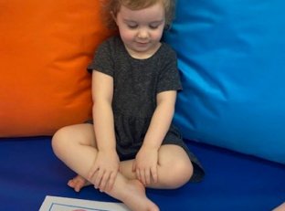 Img Girl Sitting Crossed Legged